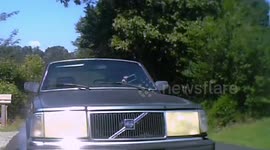 Cyclist rear-ended by a Volvo - driver using cell phone at point of collision