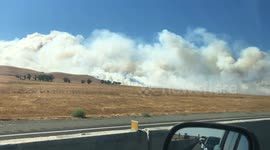 Highway partially shut as brush fire near Bay Area spreads