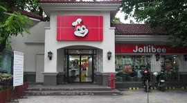 Fast-food store has a tree growing through the middle