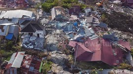 Aerial footage shows houses flattened, piles of debris littered on earthquake-stricken Indonesia island