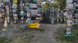 Take a walk through a 90,000 Sign post forest