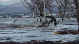 Mud floods hit the city of Palu, after the earthquake and tsunami