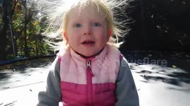 Toddler's hair becomes an adorable static mess after jumping on trampoline