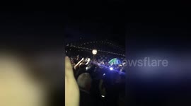 Hundreds of protestors boo the Sydney Opera House advertisements
