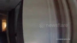 Police arrest man as he stands over his wife threatening to kill he