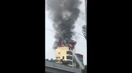 The nine storey building burned after the owner burned the paper