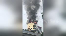 Newsflare Edit - The nine storey building burned after the owner burned the paper