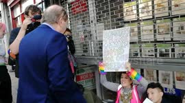 Homophobic Estate agency aren't happy Queer Kiss-In front of the Wood Green Estate, London, UK