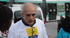Illegal Ford stand installed by employees of Ford automobile brand protesting against the dismissals, face to the Paris Auto Show (Salon du Mondial de l automobile). Presence of Phillipe POUTOU, french politician and Gael QUIRANTE, powerful postman syndic