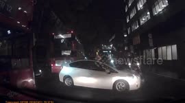 Moment 'Uber driver' collides with cyclist in busy Central London road