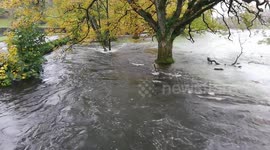 Heavy rainfall in Cumbria causing floods and dangerous driving conditions