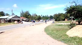Man with amazing bicycle balance wizard live along the road.