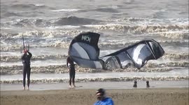 Beachgoers enjoy strong winds in UK ahead of Hurricane Gonzalo