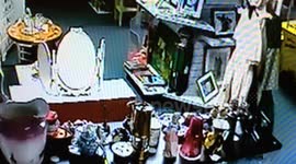 another picture falling off while shop was open