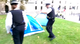 Police begin eviction of tents from Occupy Democracy protest.