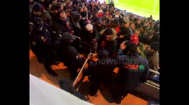 Spanish riot police clash with AS Roma fans