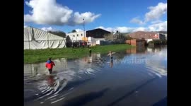 #flood #carmarthen kids playing in water https://t.co/xxX4Z6sAtr