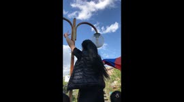 Girl waving Armenian flag during Velvet Revolution