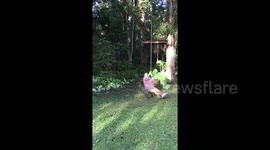 Swinging mom accidentally knocks over toddler when she gets too close