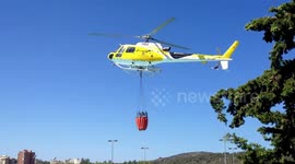 Amazing Video Fire Helicopter Pilot using swimming pool