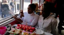 Pink Ribbon Afternoon Tea on board a route master bus