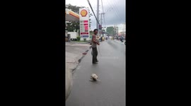 Brave woman confronts man dragging injured puppy on road