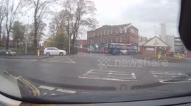 Volvo looses control on roundabout the back end of the car steps out. An off camber wet roundabout.