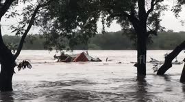 Raging floodwaters carry entire house downstream as severe flooding hits Central Texas