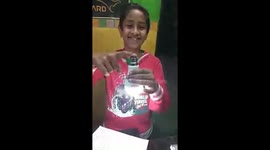 He's a bright spark! The incredible moment an Indian boy lights up a light bulb with just his bare hands