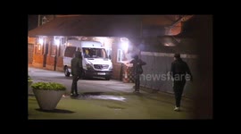 Youths setting off fireworks in Earls Court estate