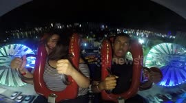 Woman can't stop laughing after friend passes out FOUR times on slingshot ride in Florida
