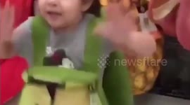 Little girls decides what she wants to be for halloween
