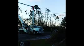Linemen restore power in hurricane-hit Florida Panhandle as 155,000 still without