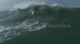 Spectacular Drone Footage captures Wipeout and Aftermath in Nazaré, Portugal