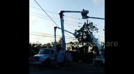Linemen restore power in hurricane-hit Florida Panhandle as 155,000 still without