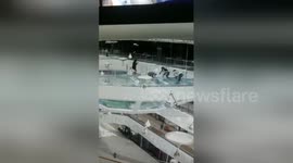 Woman falls into shark tank at Chinese mall