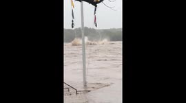Footage shows broken parts of bridge floating in flooded Texas river