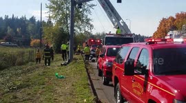 Female Driver launches car over fence