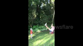 Swinging mom accidentally knocks over toddler when she gets too close