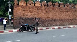Briton and Canadian face prison after spraying 'Scousse Lee' on 800-year-old Thai fortress