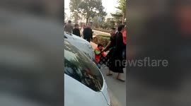 Cleaner gets beaten up after stopping boy from defecating on street
