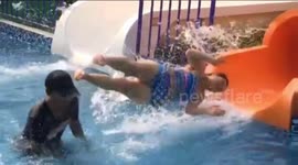 Tourist smashes into lifeguard as she exits water slide