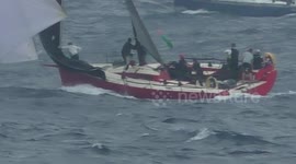 Sailing boat fights to keep her front sail during todays Rolex middle sea race. A near fail