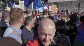 Protesters dancing and playing drums at People's Vote March