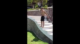 Man failing at doing a front flip