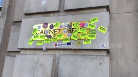 People’s Vote March - anti Brexit protesters cover the Government Cabinet Office in stickers