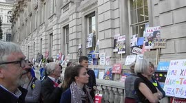 The war rooms in Whitehall in London covered in Bollocks to Brexit stickers and posters and banners by Prosters on the demo by Jim Connor 2018
