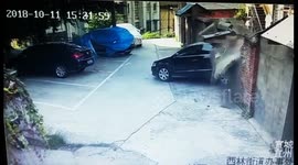 In like a glove! Newbie driver smashes three parked cars and then wall