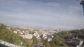 GoPro view: Panoramic moving view of the canopy of Paris from a suburban train, Meudon station. (View of the Eiffel and Montparnasse Tower, etc). 23 october 2018.