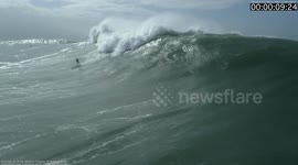 WITH SLATES: Astonishing footage of a Portuguese surfer wiping out